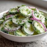 Creamy Cucumber Salad with Dill and Red Onion